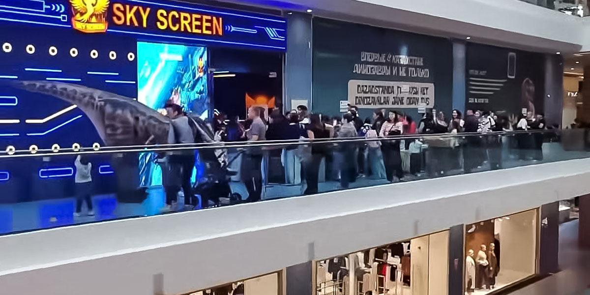 Sky Screen storefront and visitor queue in Almaty mall
